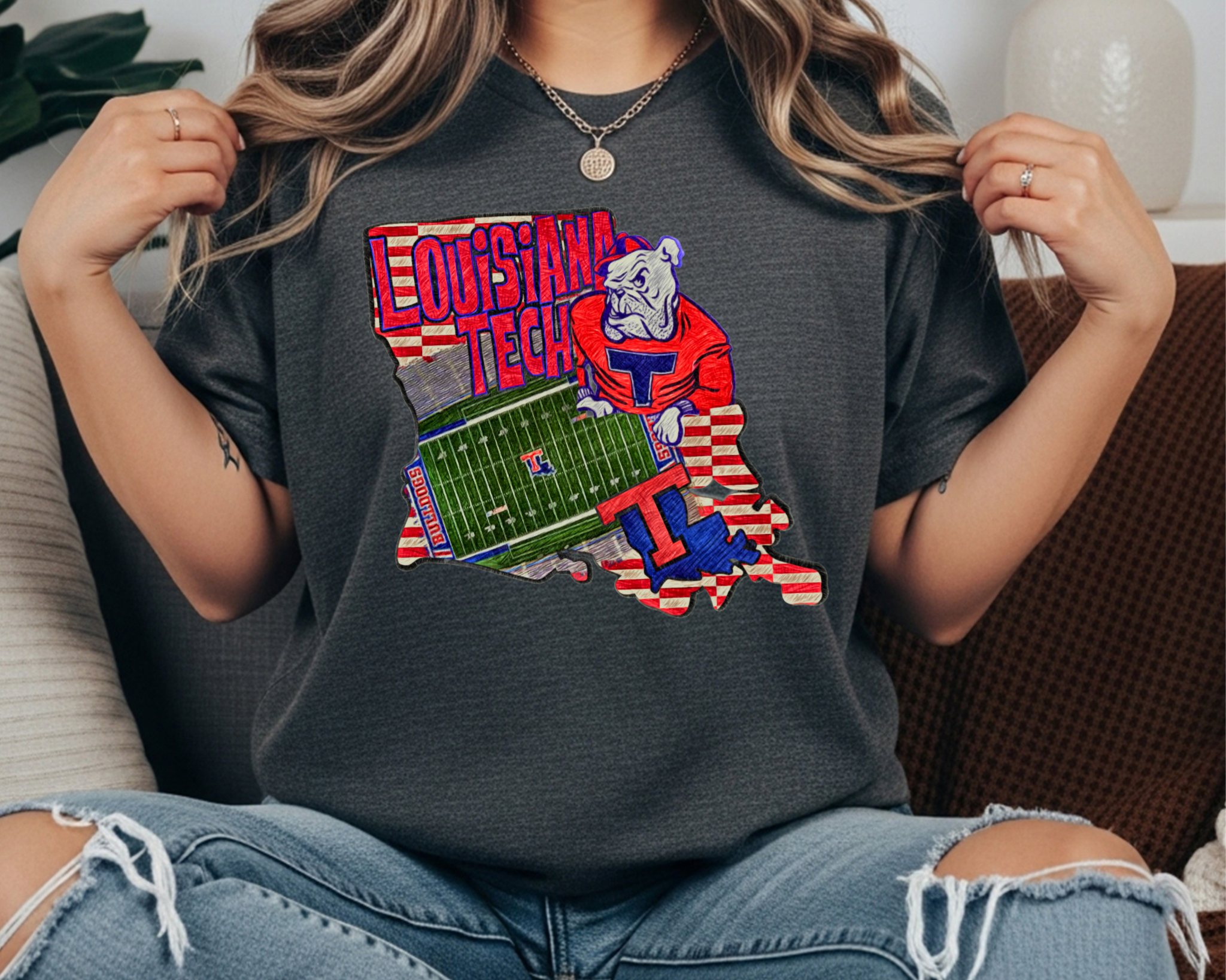 Comfort Colors Louisiana Tech Bulldogs t-shirt featuring a Louisiana state graphic with the Tech football field and bulldog mascot on a soft ivory tee
