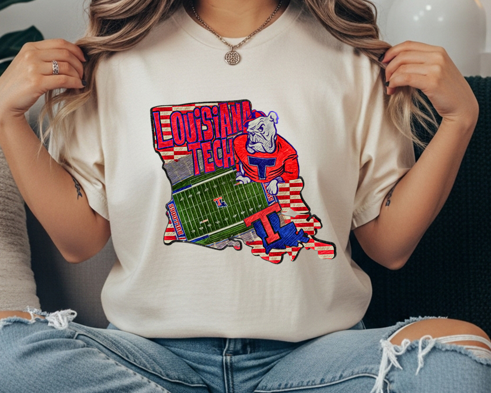 Comfort Colors Louisiana Tech Bulldogs t-shirt featuring a Louisiana state graphic with the Tech football field and bulldog mascot on a soft ivory tee