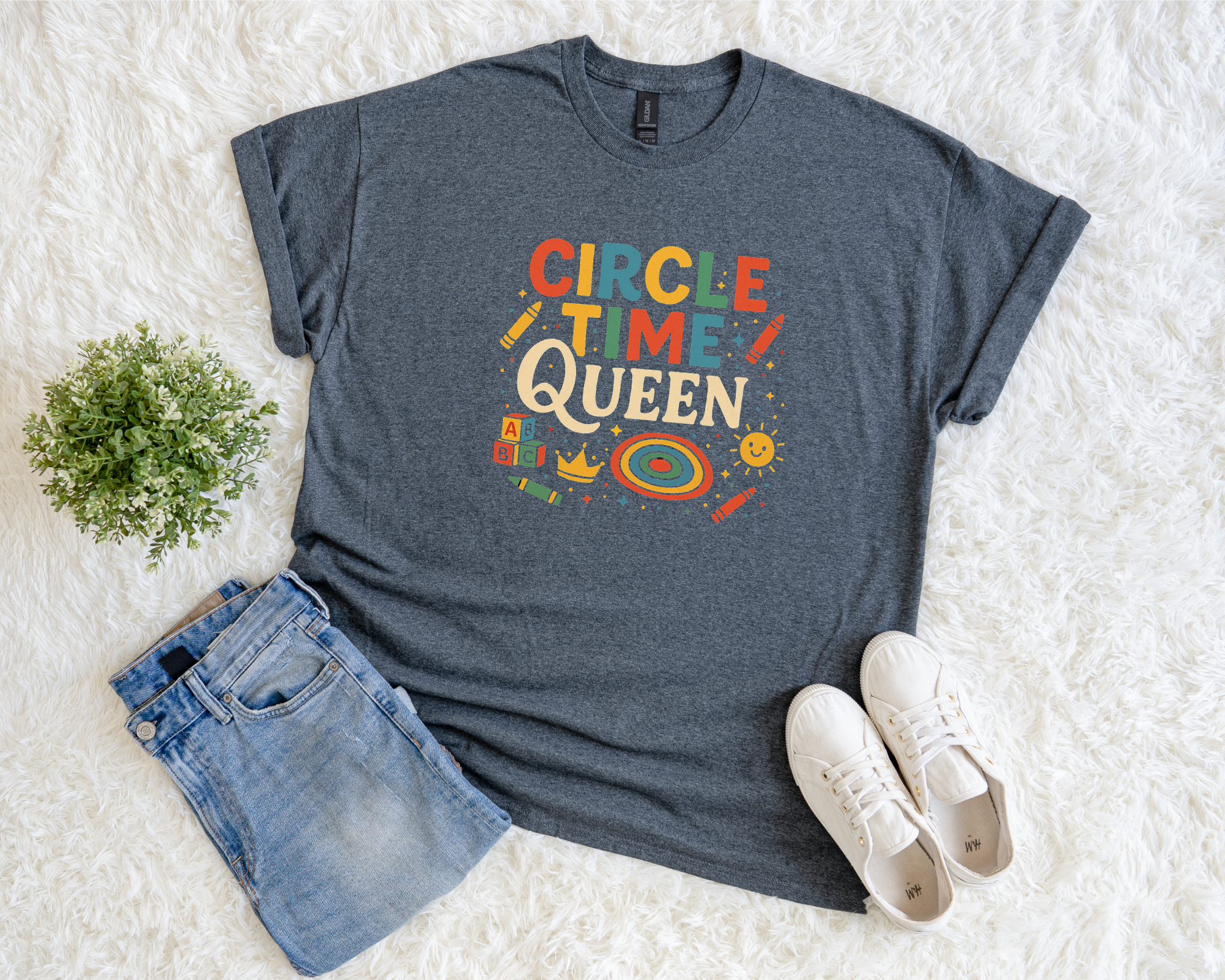 Light blue t-shirt with “Circle Time Queen” in colorful text with crayons and ABC blocks, teacher-themed design.