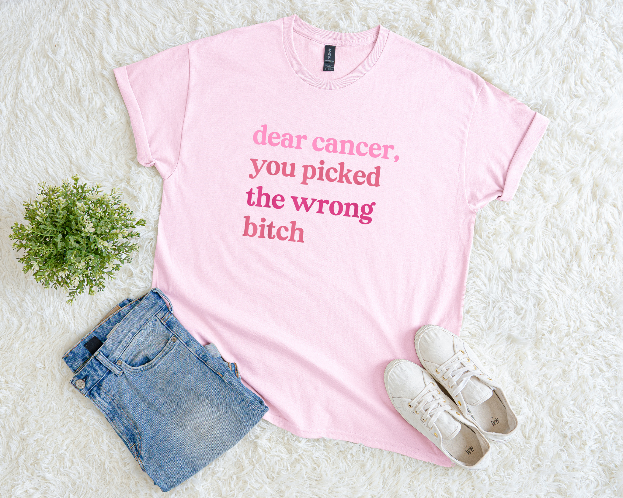 Light pink breast cancer awareness t-shirt with bold text reading “dear cancer, you picked the wrong bitch.