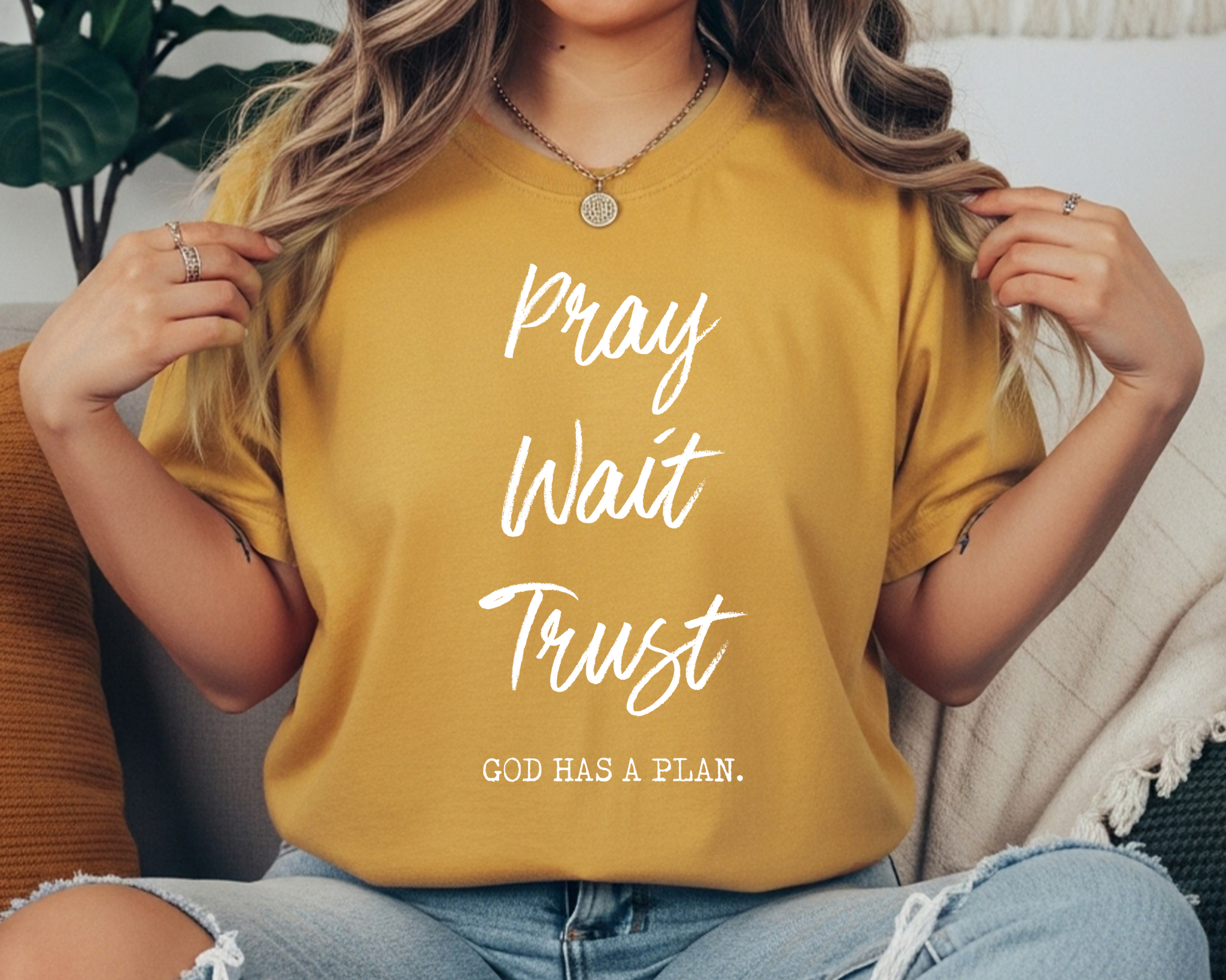 MUSTARD Comfort Colors faith tee with white text reading “Pray Wait Trust – God Has a Plan.”
