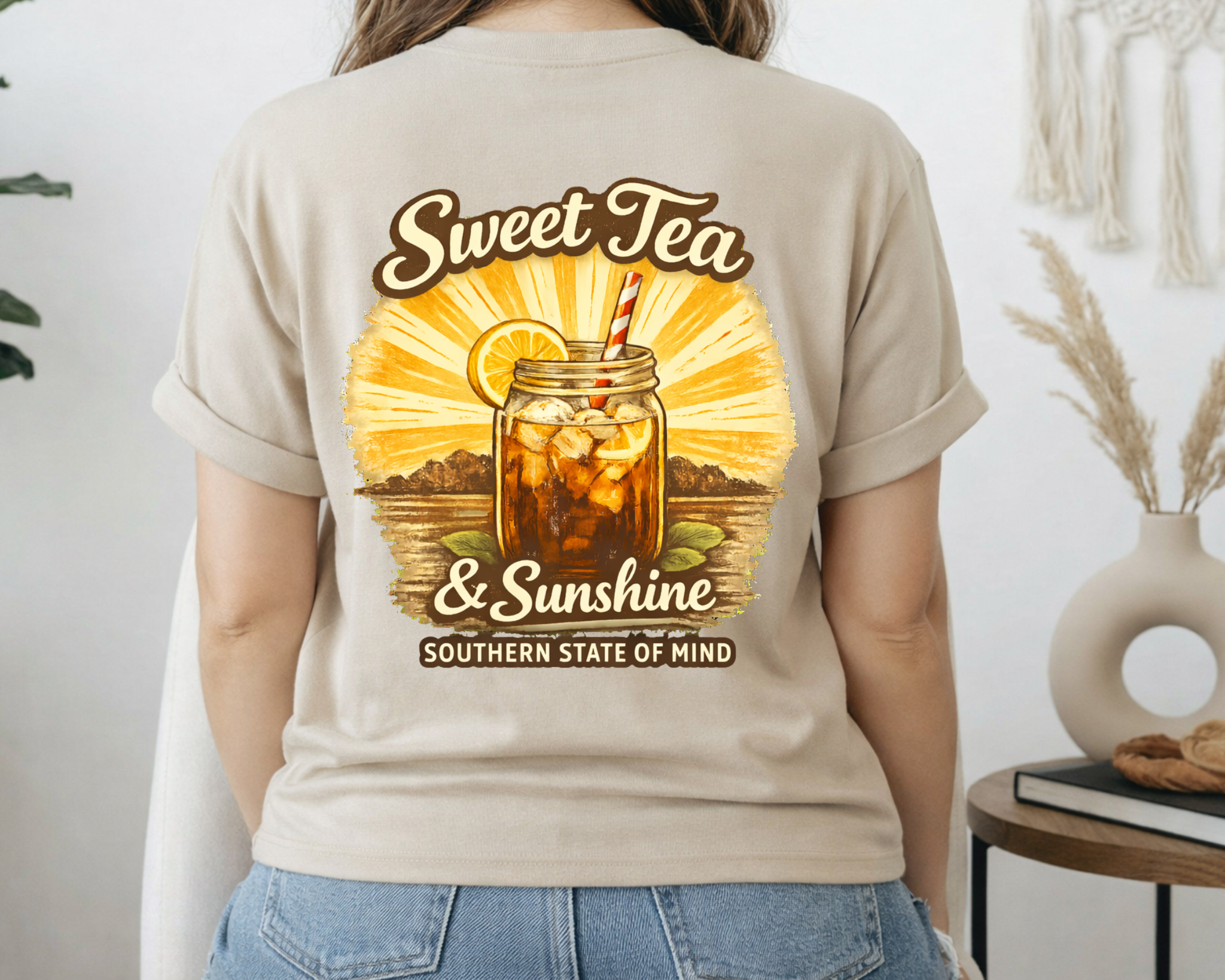 Person wearing a t-shirt with 'Sweet Tea & Sunshine' design