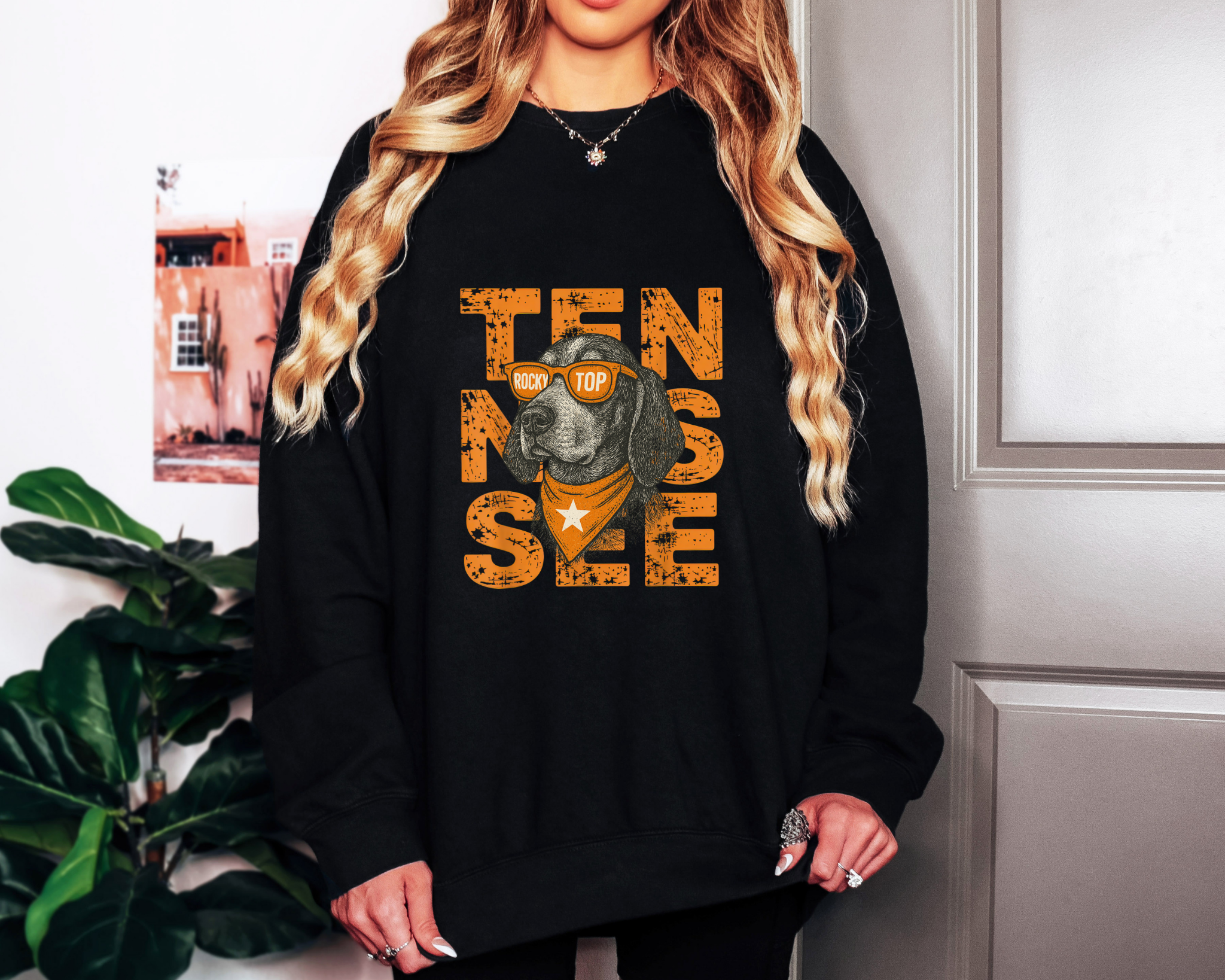 black Comfort Colors sweatshirt featuring bold orange TENNESSEE text with smokey wearing “Rocky Top” sunglasses