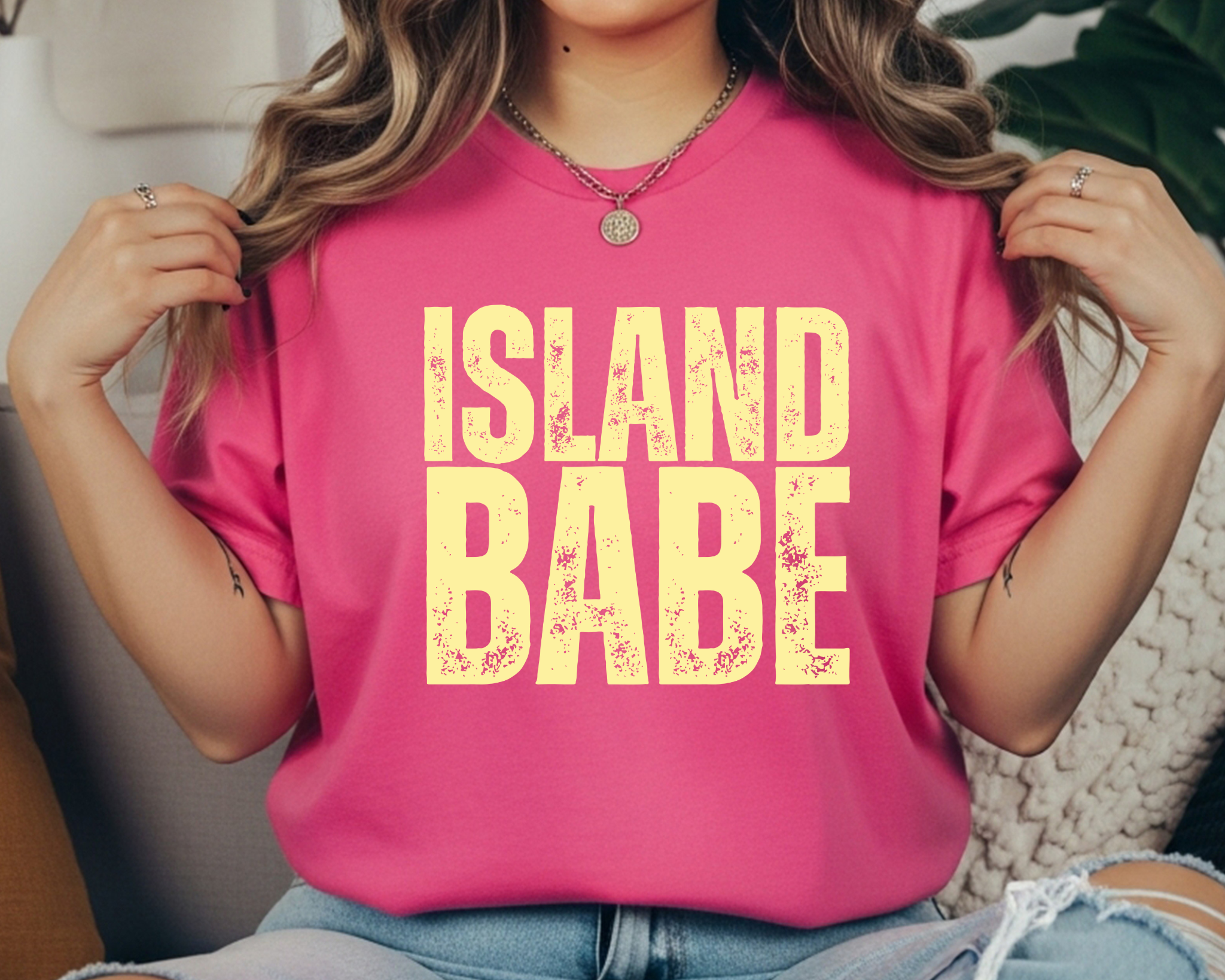 Comfort Colors t-shirt with cream distressed stacked text that reads “ISLAND BABE.”