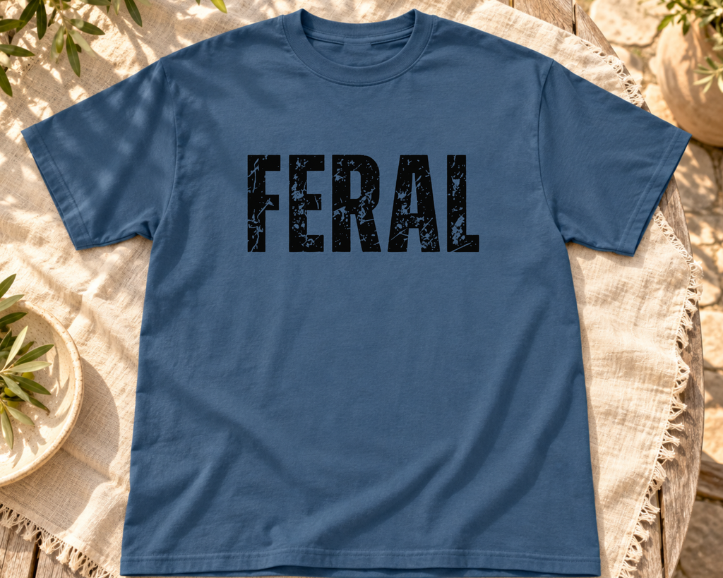 Feral Vintage Graphic Tee | Distressed Black Lettering |Trendy Boutique Apparel