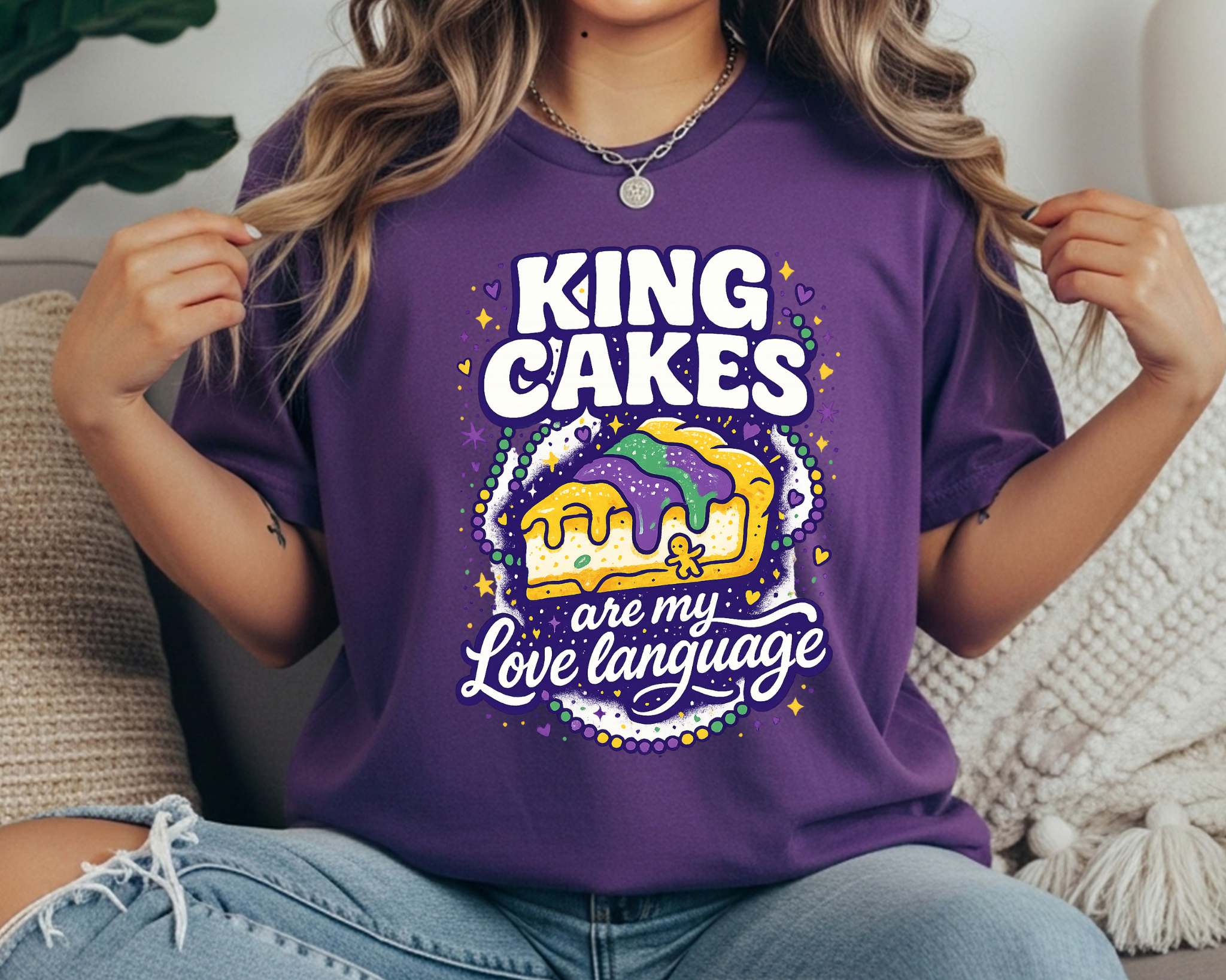 Mardi Gras t-shirt with a colorful king cake slice graphic and white lettering that says “King Cakes are my Love Language,” surrounded by hearts, stars, and confetti.