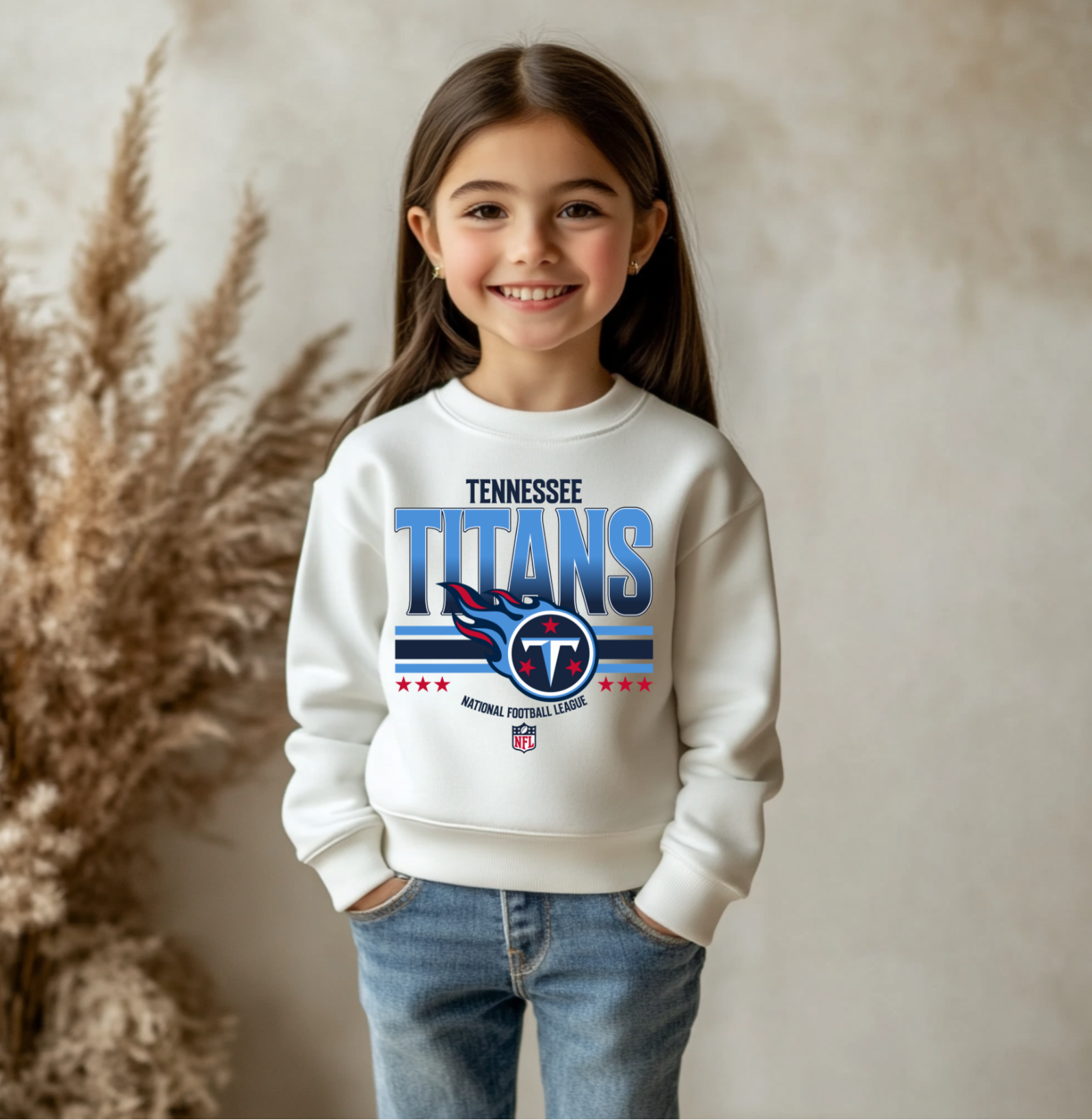 A youth-sized Tennessee Titans-inspired crewneck sweatshirt featuring bold blue and red team-style graphics on a soft gray fabric, perfect for kids who love football.